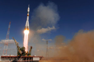 A Soyuz booster sends Soyuz TMA-13 and its crew safely to the International Space Station.