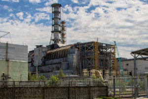 The decaying remains of Reactor 4 and the Sarcophagus structure containing the damaged core.